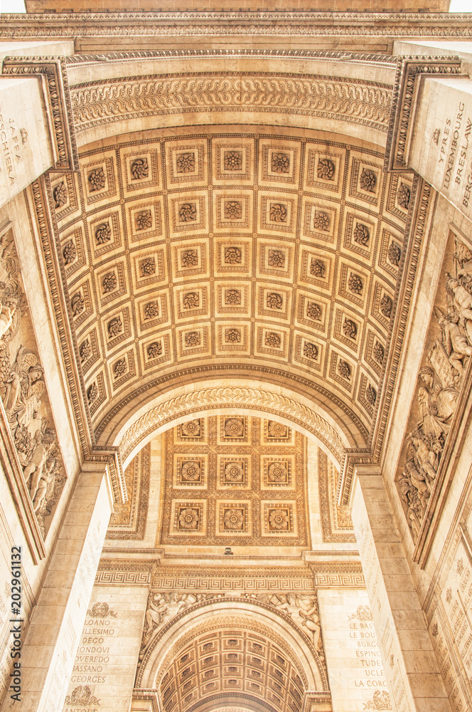 The Arc de Triomphe in paris, seen from below