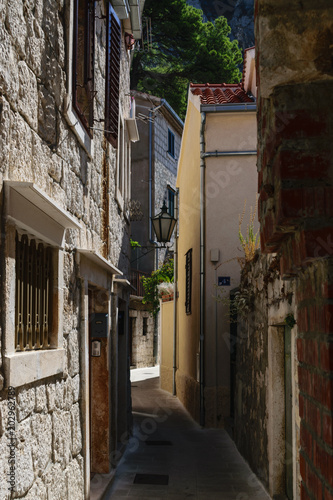Fototapeta Naklejka Na Ścianę i Meble -  Narrow Street in Omis, Croatia