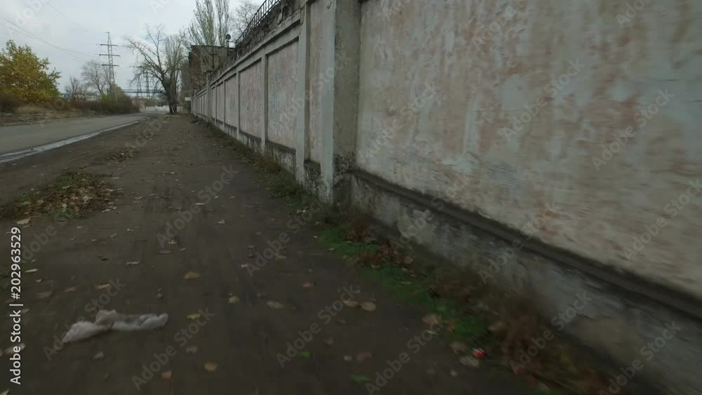 Walking bike in an industrial area on outskirts of urban city