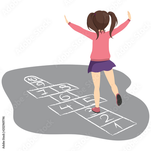 Active young girl playing hopscotch having fun jumping