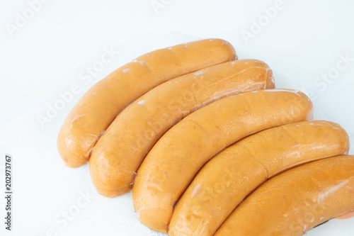 Sausages in plastic pack.