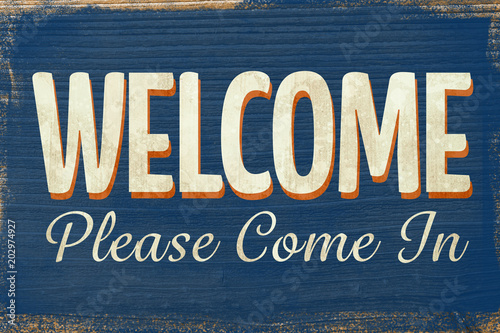 фотографія A Vintage coloured open sign saying come in