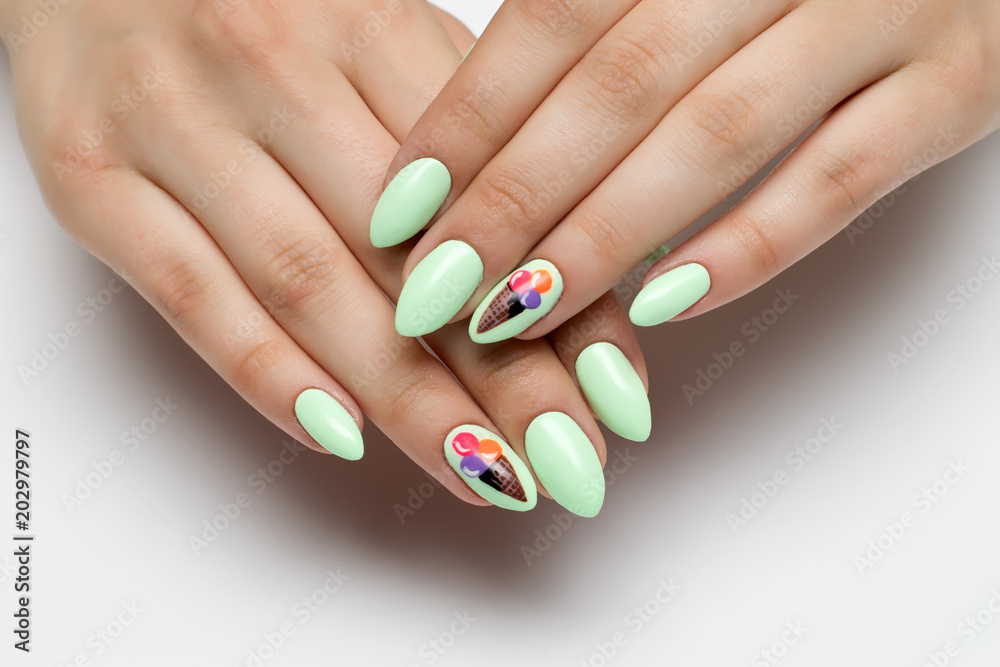 mint, light green manicure on sharp long nails with painted ice cream
mint, light green manicure on sharp long nails with painted ice cream