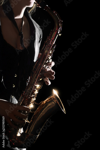 Saxophone Player Saxophonist playing jazz music. Sax player