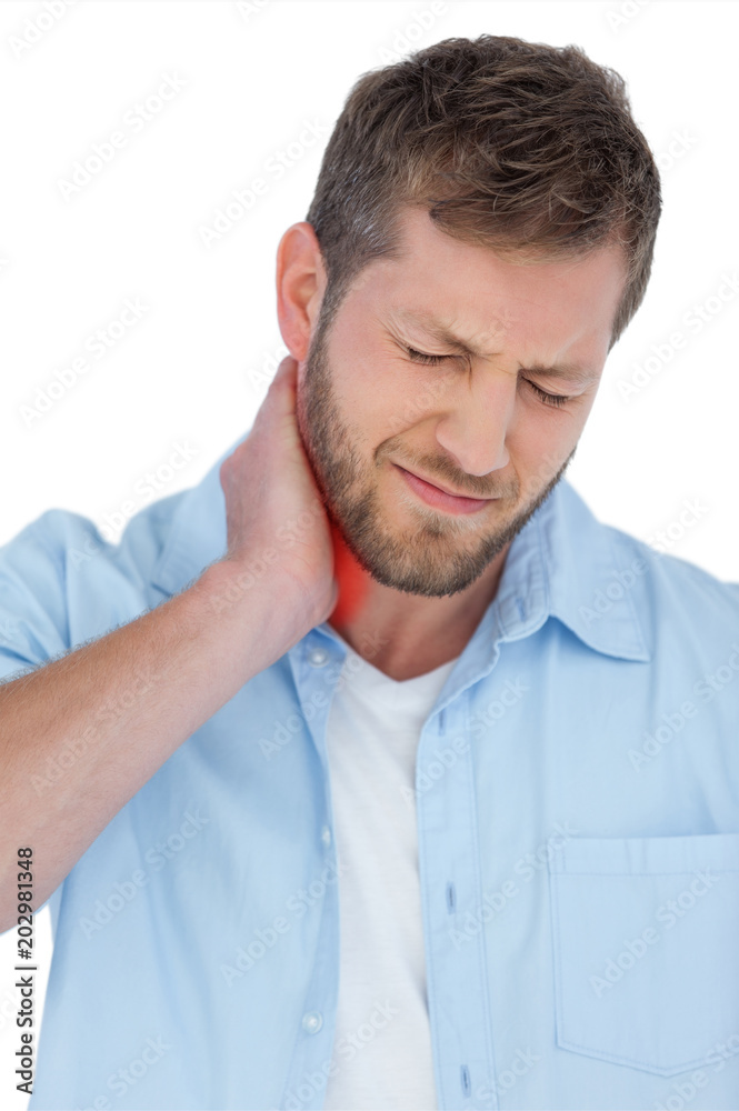 Trendy model on white background having a painful neck Trendy model on white background having a painful neck