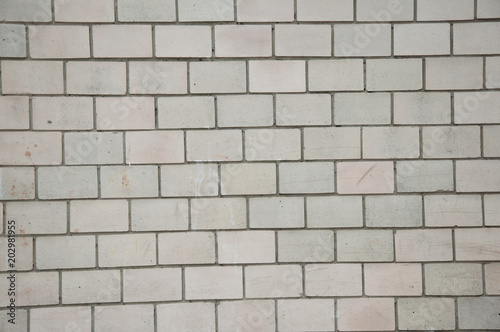 Textured background. White brick wall