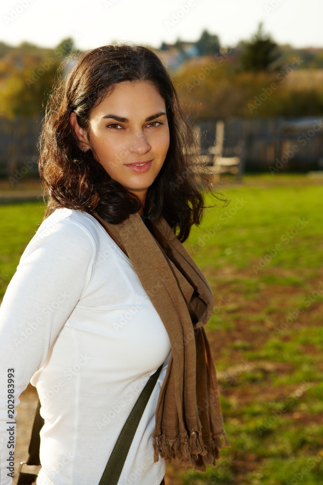 Outdoor portrait of woman Autumn sunlight