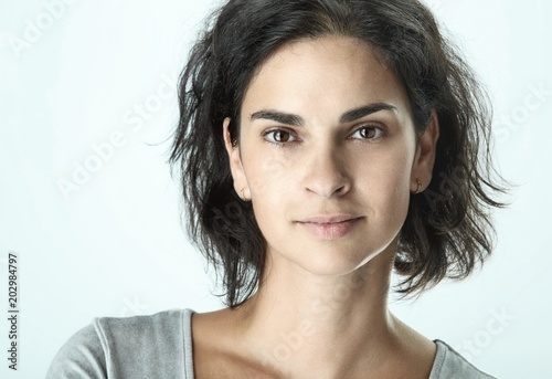 Portrait of beautiful adult woman on white
