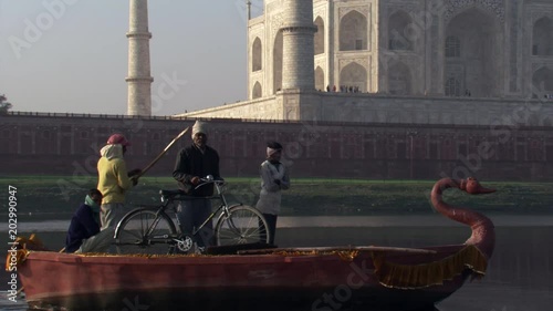Ferryboatmen on River Yamuna at the Taj Mahal in Agra photo