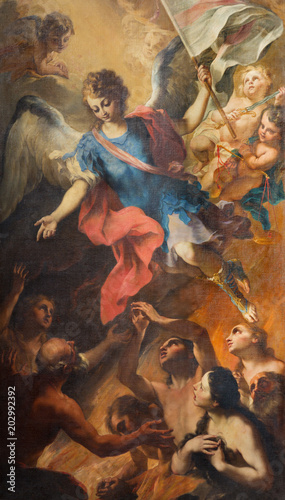 TURIN, ITALY - MARCH 15, 2017: The painting of Archangel Michael and the souls of purgatory in church Chiesa di San Francesco da Paola by Stefano Maria Legnani from end of 18. cent.