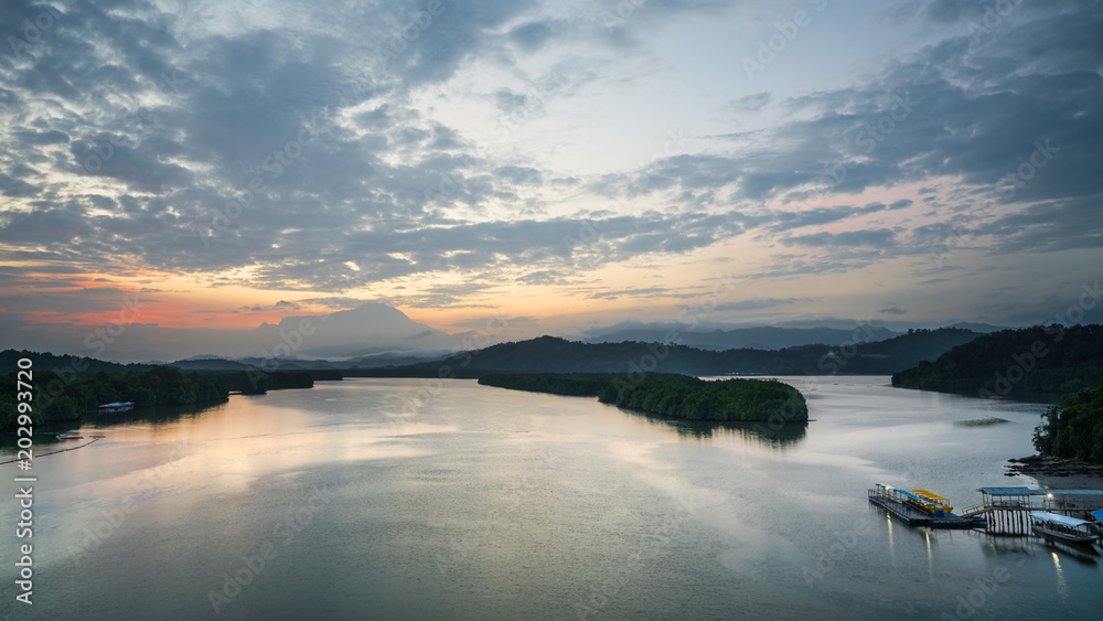 Fototapeta premium Vew of Mengkabong river and Mt Kinabalu from Mengkabong bridge.