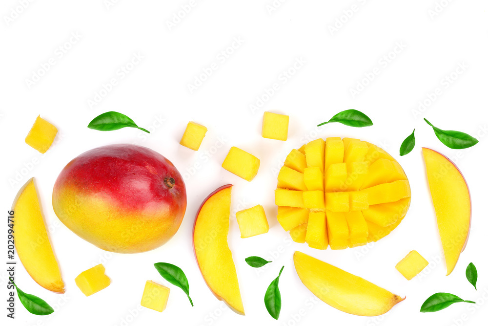Mango fruit and slices decorated with leaves isolated on white background with copy space for your text. Top view Mango fruit and slices decorated with leaves isolated on white background with copy space for your text. Top view