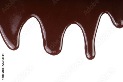 Melted chocolate dripping isolated on white background