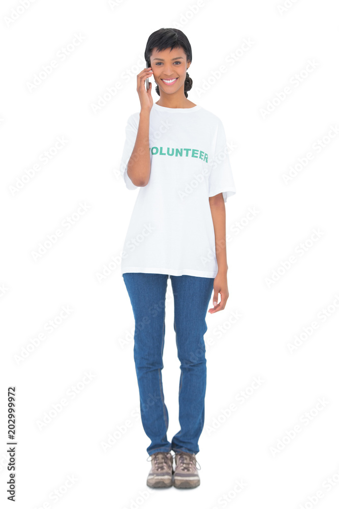 Cute black haired volunteer posing looking at camera Cute black haired volunteer posing looking at camera