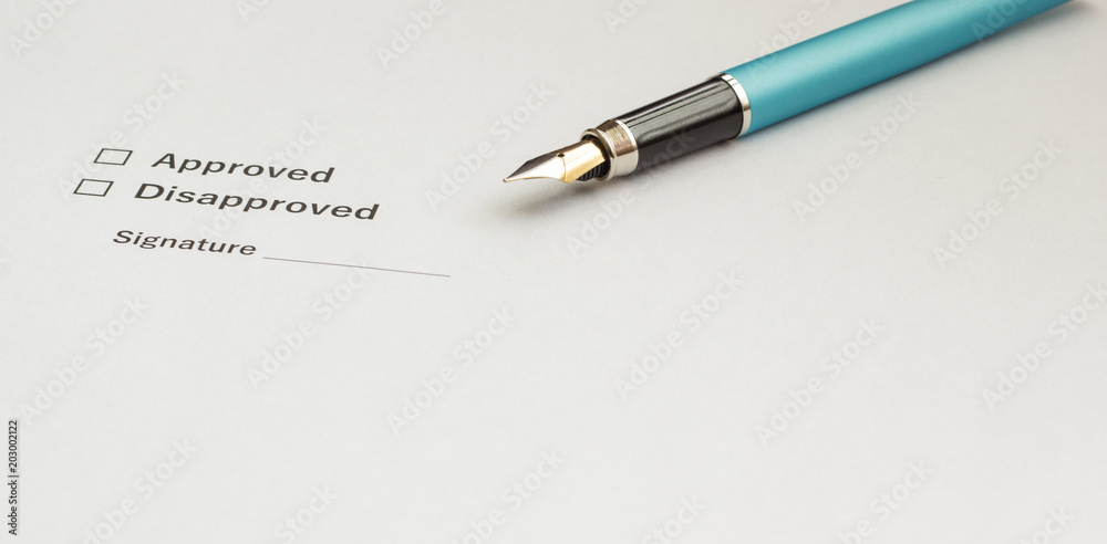 Pen for signing a document or decision, close-up Pen for signing a document or decision, close-up