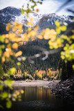 A lake near Aspen, Colorado surrounded by autumn trees. 