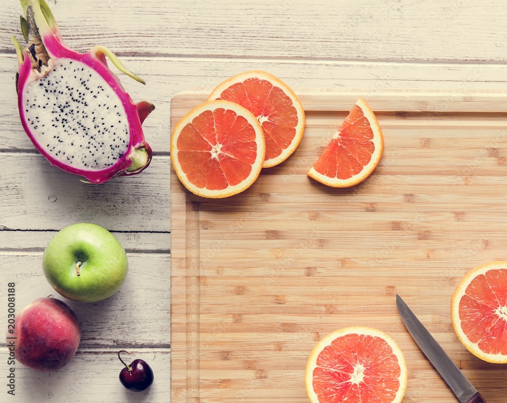 Assortment of tropical citrus fruits background Assortment of tropical citrus fruits background