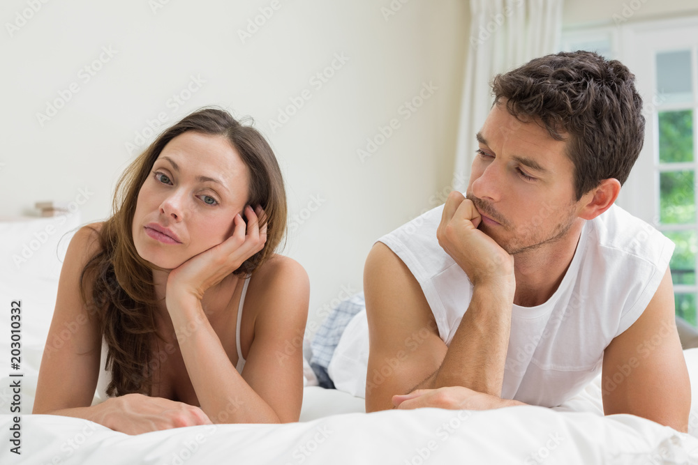 Couple not talking after an argument in bed Couple not talking after an argument in bed