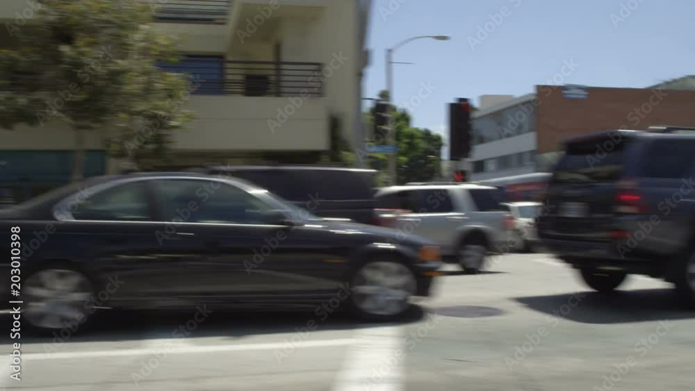 Left Side view of a Driving Plate: Car traveling on Pico Boulevard in Santa Monica, California, turns right onto Main Street and continues, turns right onto Olympic Drive, and continues to the intersection with 4th Street. Left Side view of a Driving Plate: Car traveling on Pico Boulevard in Santa Monica, California, turns right onto Main Street and continues, turns right onto Olympic Drive, and continues to the intersection with 4th Street.