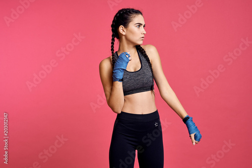 young woman with dumbbells © SHOTPRIME STUDIO