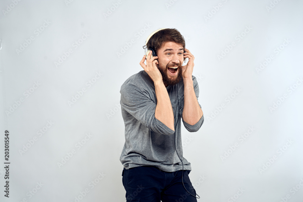 young man talking on the phone isolated on white young man talking on the phone isolated on white
