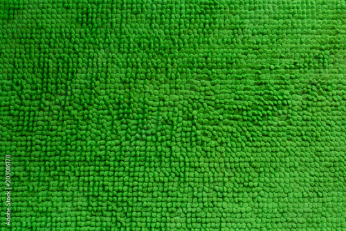Green rug pattern texture background.
