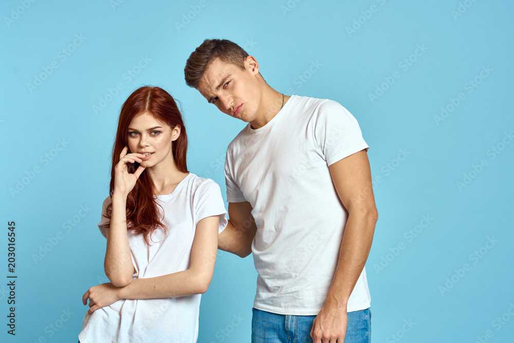 Naklejka premium Young couple of t-shirts