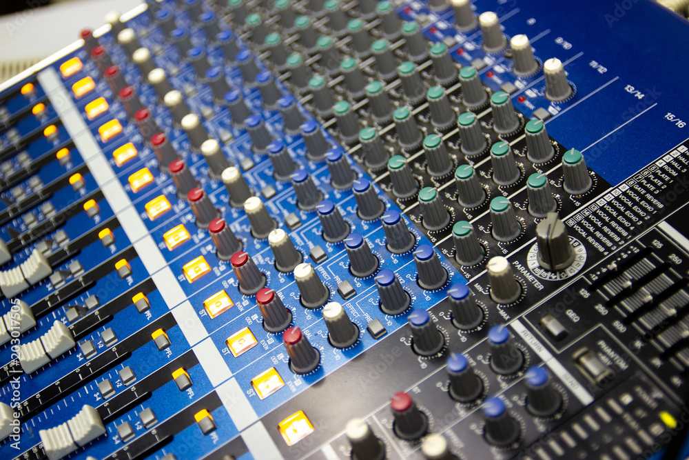 Mixing Console  of a big HiFi system  The audio equipment, control panel of digital studio mixer.  