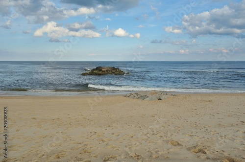 View of the beach in Belmar, New Jersey, along the long Jersey Shore beach on the Atlantic Ocean  photo