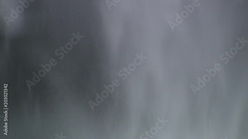 Close-up of cascade dropping over lip of Latourell Falls in Columbia Gorge, Oregon photo