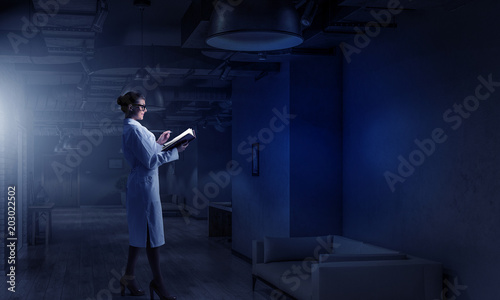 Wallpaper Mural Scientist woman doing research. Mixed media Torontodigital.ca