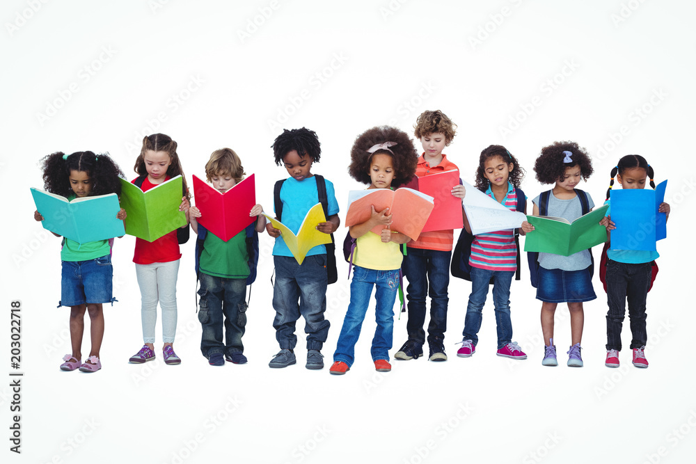 A row of children standing together reading books A row of children standing together reading books
