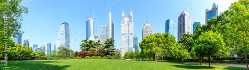 city park with modern commercial building background in shanghai