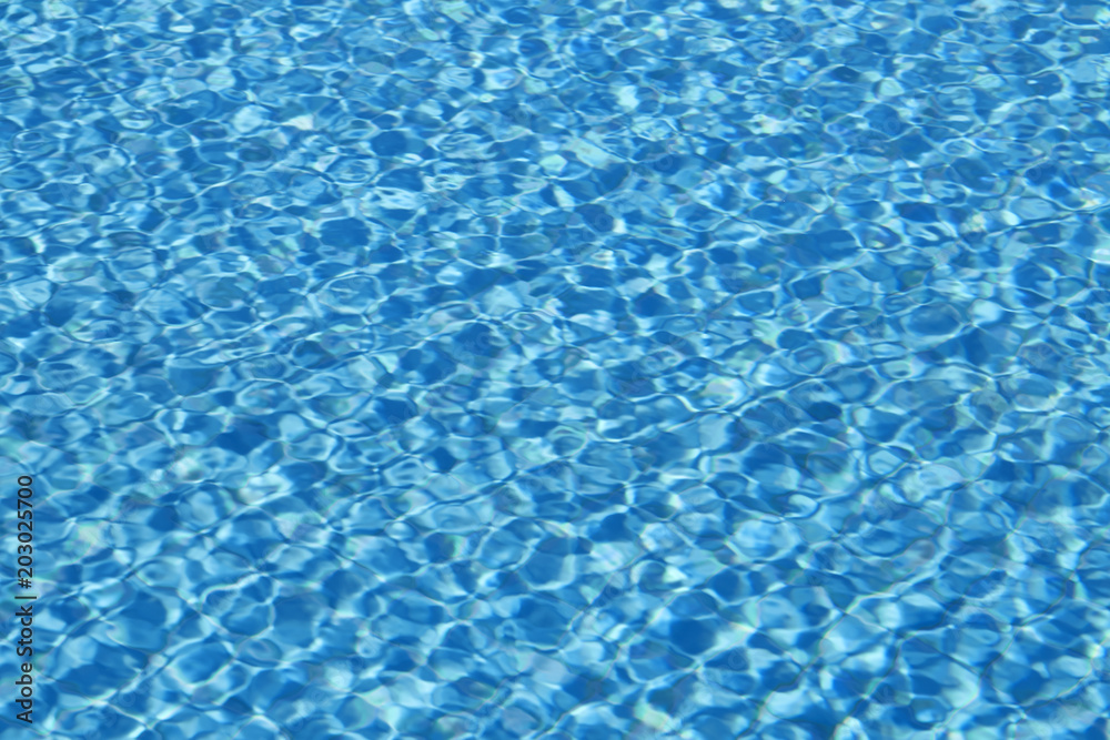 Rippled water texture in swimming pool