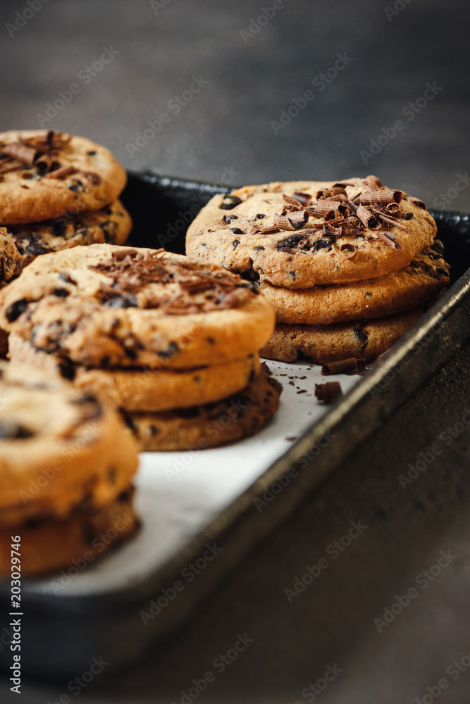 Fresh homemade chocolate cookies baking tray close up
