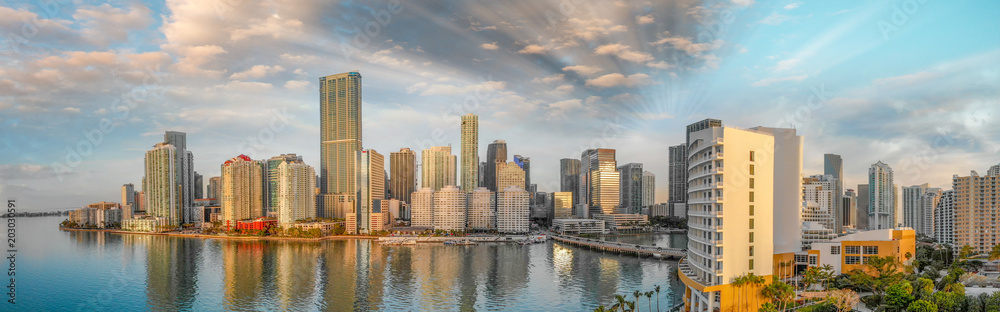 Panoramic aerial view of Downtown Miami and Brickell Key at sunrise