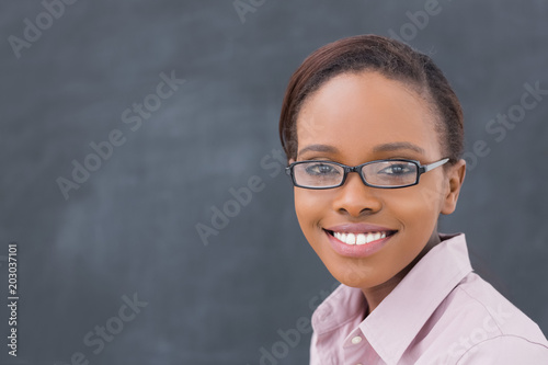 Close up of a black woman wearing glasses