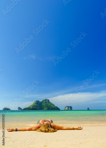 woman resting at the tropical island of Poda in Thailand