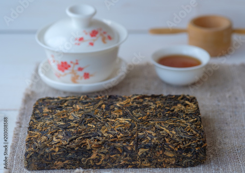 Chinese red tea Dian Hong in the shape of a brick
