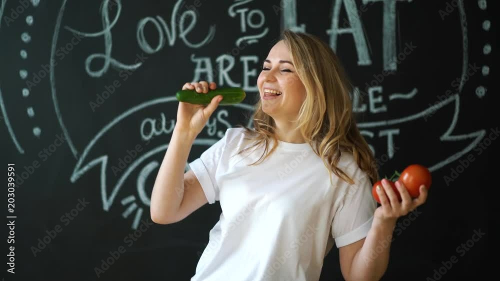 Young Woman Cooking. Healthy Food - Vegetable Salad. Diet. Dieting Concept. Healthy Lifestyle. Cooking At Home. Prepare Food Young Woman Cooking. Healthy Food - Vegetable Salad. Diet. Dieting Concept. Healthy Lifestyle. Cooking At Home. Prepare Food