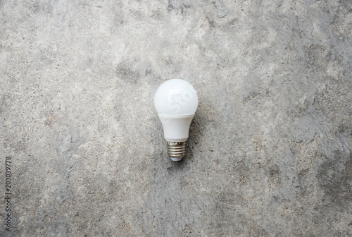 LED bulb on the concrete background