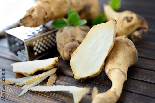 Jerusalem artichoke on a wooden table 