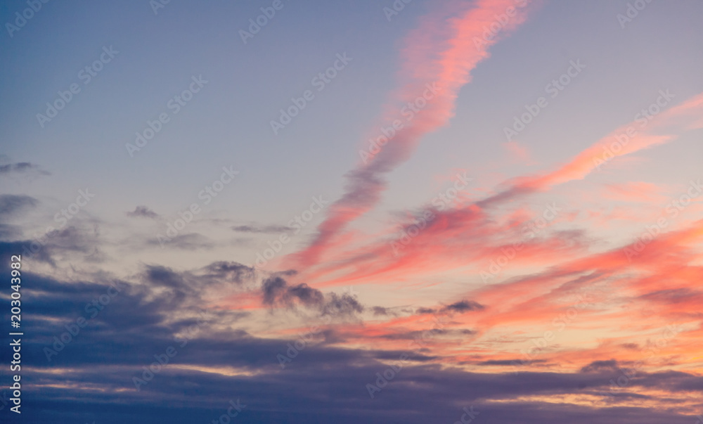 Beautiful sunset sky with clouds, natural abstract background and texture