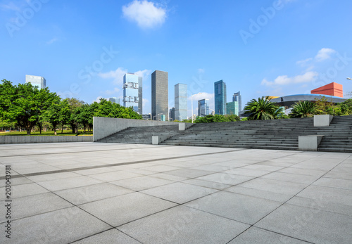 empty square floor and modern commercial office buildings