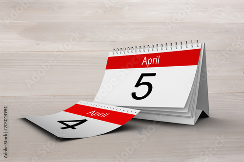 April calendar against bleached wooden planks background