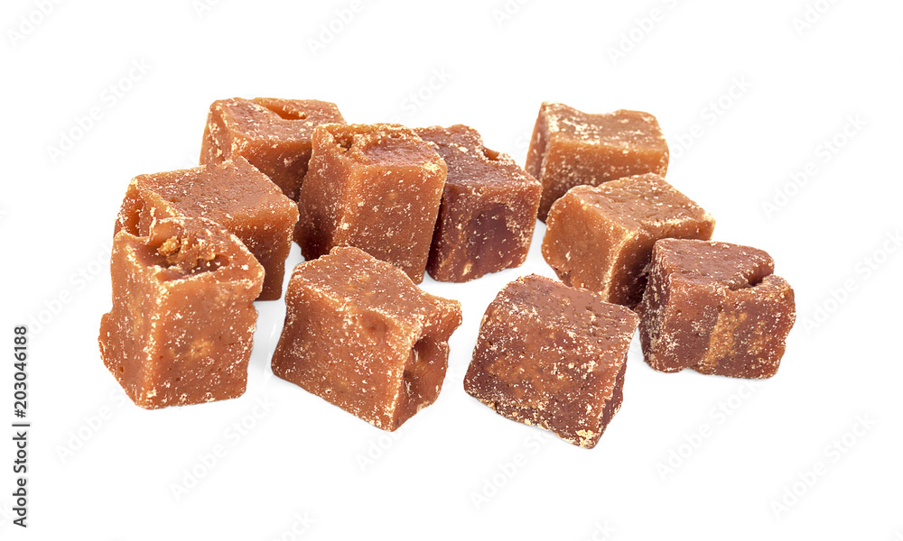 The palm sugar or Jaggery on white background The palm sugar or Jaggery on white background