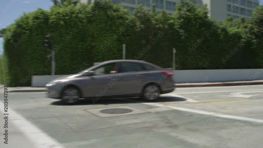 Front view of a Driving Plate: Car traveling on Pico Boulevard in Santa Monica, California, turns right onto Main Street and continues, turns right onto Olympic Drive, and continues to the intersection with 4th Street. Front view of a Driving Plate: Car traveling on Pico Boulevard in Santa Monica, California, turns right onto Main Street and continues, turns right onto Olympic Drive, and continues to the intersection with 4th Street.