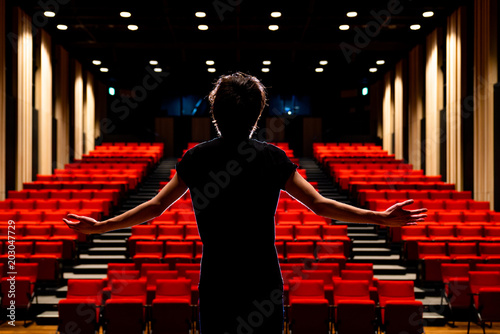 Young actor in a theater. photo