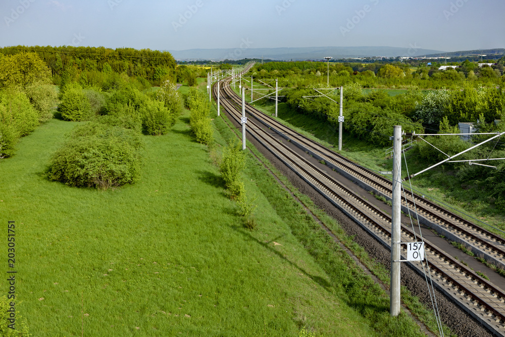rails in rural landscape for german high speed train Intercity Express (ICE) rails in rural landscape for german high speed train Intercity Express (ICE)