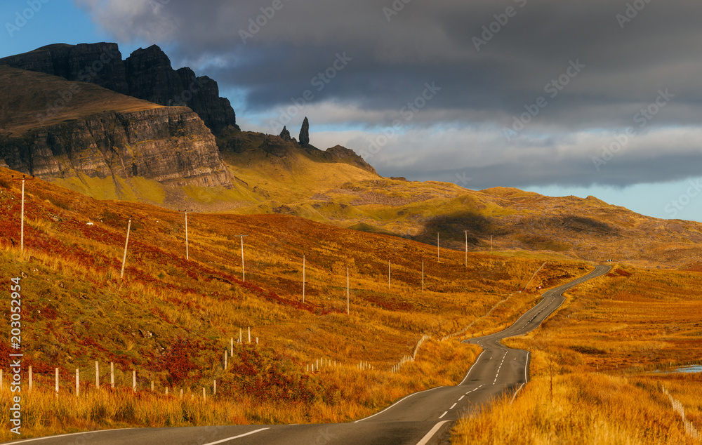 Road on Isle of Skye with a view on Old Man of Storr peak